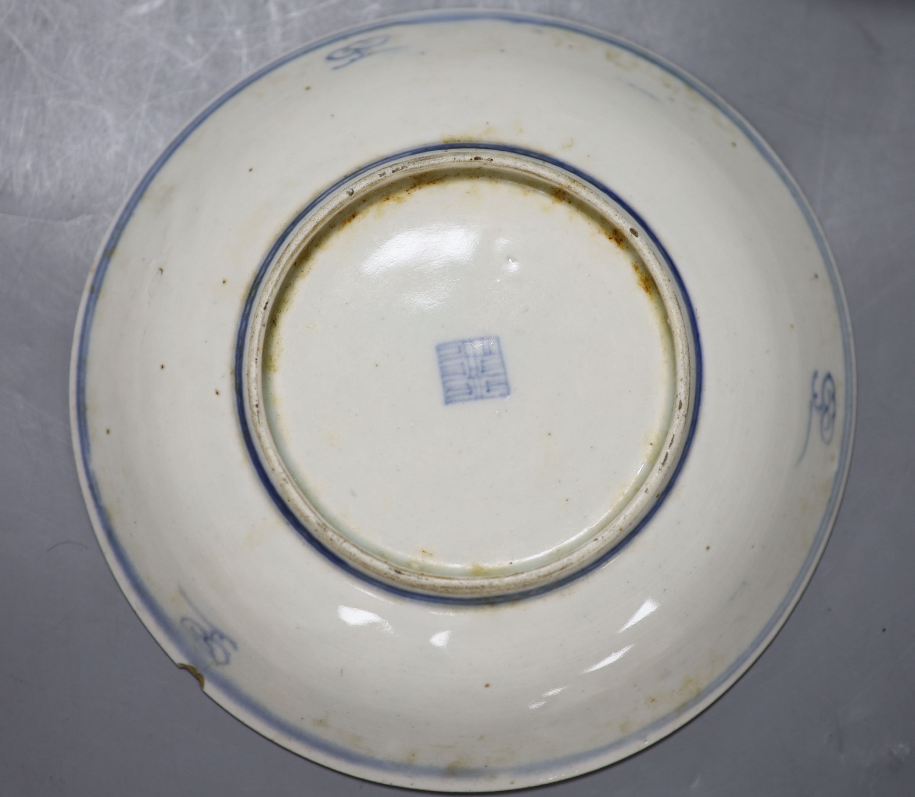 A Chinese blue and white dish, diameter 18cm, and a green glazed bowl